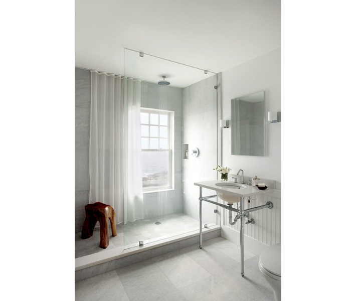 neutral bathroom with large square tiles on floor.001